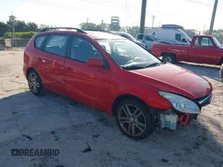 2010 Hyundai Elantra Touring SE with VIN KMHDC8AE8AU070112, listed as a IAAI auction lot 41803426 with 117,816 mi miles. Bid and sale history available at carsss.com. Image 1.