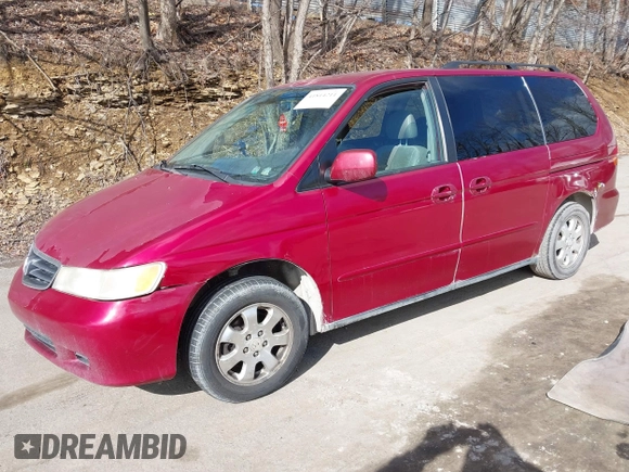 2003 Honda Odyssey EX-L with VIN 5FNRL18923B130410, listed as a IAAI auction lot 41814211 with 209,335 mi miles and . Bid and sale history available at DreamBid. Image 17.
