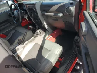 2008 Jeep Wrangler X with VIN 1J4FA24118L548583, listed as a Copart auction lot 52644785 with 56,886 mi miles and Salvage Title. Bid and sale history available at DreamBid. Image 8.
