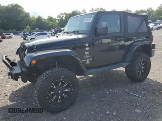 2011 Jeep Wrangler Sahara with VIN 1J4AA5D15BL552185, listed as a Copart auction lot 63065185 with 159,850 mi miles and Salvage title. Bid and sale history available at DreamBid. Image 1.