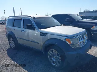 2008 Dodge Nitro SXT with VIN 1D8GU28K68W271921, listed as a IAAI auction lot 41772124 with 233,078 mi miles. Bid and sale history available at carsss.com. Image 1.