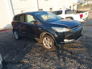 2013 Ford Escape SEL z VIN 1FMCU9H9XDUC38151, wystawiony jako IAAI lot #42596336 z przebiegiem 183 971 mil mil oraz . Historia ofert i sprzedaży dostępna na DreamBid. Obrazek 1.