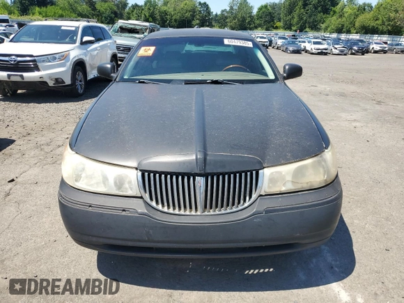 2001 Lincoln Town Car Cartier L z VIN 1LNHM85W71Y624315, wystawiony jako Copart lot #60479385 z przebiegiem 171 485 mil mil oraz Czysty tytuł • Clean title. Historia ofert i sprzedaży dostępna na DreamBid. Obrazek 5.