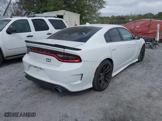 2020 Dodge Charger Scat Pack with VIN 2C3CDXGJ9LH114575, listed as a IAAI auction lot 41682792 with 137,321 mi miles. Bid and sale history available at carsss.com. Image 4.