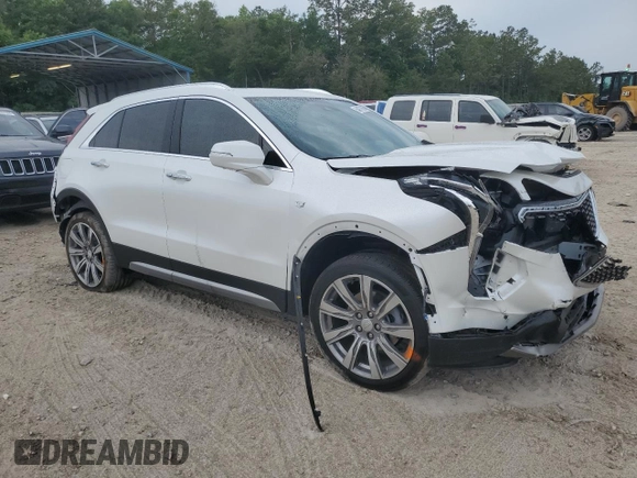 2023 Cadillac XT4 FWD Premium Luxury with VIN 1GYFZCR42PF193101, listed as a Copart auction lot 54977605 with 14,258 mi miles and Non repairable. Bid and sale history available at DreamBid. Image 4.