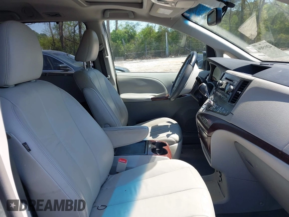 2011 Toyota Sienna XLE AAS with VIN 5TDYK3DC3BS083443, listed as a IAAI auction lot 42015856 with 138,045 mi miles and . Bid and sale history available at DreamBid. Image 5.