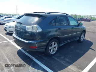 2007 Lexus RX with VIN 2T2GK31U07C021695, listed as a IAAI auction lot 42032252 with 146,023 mi miles. Bid and sale history available at carsss.com. Image 4.