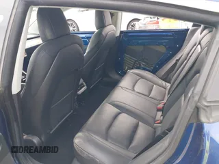 2020 Tesla Model 3 Standard Range Plus z VIN 5YJ3E1EA8LF785010, wystawiony jako IAAI lot #42130951 z przebiegiem 90 072 mil mil oraz . Historia ofert i sprzedaży dostępna na DreamBid. Obrazek 8.