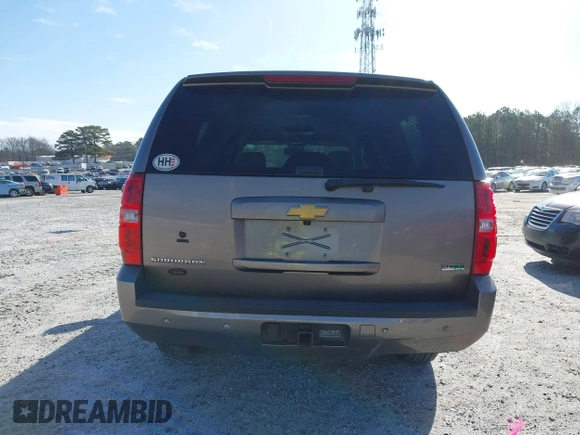 2011 Chevrolet Suburban LT with VIN 1GNSCJE00BR122636, listed as a IAAI auction lot 41594772 with 202,433 mi miles. Bid and sale history available at carsss.com. Image 15.