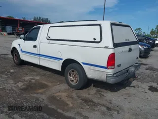 2004 Ford F-150 XL с VIN 2FTRF17W84CA14975, выставлен на аукционе IAAI как лот 42392138 с пробегом 121 799 миль миль и . История ставок и продаж доступна на DreamBid. Изображение 3.
