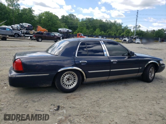 1999 Mercury Grand Marquis LS с VIN 2MEFM75W2XX683074, выставлен на аукционе Copart как лот 55679225 с пробегом 198 956 миль миль и Списание • Salvage title. История ставок и продаж доступна на DreamBid. Изображение 3.