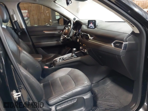 2017 Mazda CX-5 Grand Touring with VIN JM3KFBDL6H0143013, listed as a IAAI auction lot 41912979 with 122,890 mi miles. Bid and sale history available at carsss.com. Image 5.