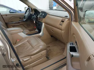 2004 Honda Pilot EX with VIN 2HKYF18594H523176, listed as a IAAI auction lot 41937743 with 310,344 mi miles. Bid and sale history available at carsss.com. Image 5.