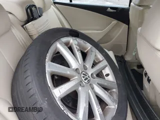 2010 Volkswagen Passat Komfort with VIN WVWJM7AN6AE154387, listed as a IAAI auction lot 42371628 with 145,054 mi miles and . Bid and sale history available at DreamBid. Image 8.
