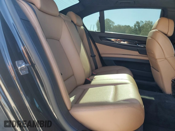 2011 BMW 7 Series with VIN WBAKX8C55BC198177, listed as a Copart auction lot 77016924 with 99,275 mi miles and Salvage title. Bid and sale history available at DreamBid. Image 10.