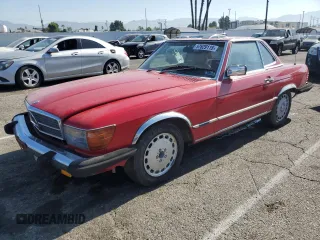 1987 Mercedes-Benz 560 SL z VIN WDBBA48D3HA066423, wystawiony jako Copart lot #57629115 z przebiegiem 75 756 mil mil oraz Tytuł czysty. Historia ofert i sprzedaży dostępna na DreamBid. Obrazek 1.