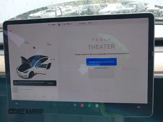 2021 Tesla Model 3 Standard Range Plus z VIN 5YJ3E1EA5MF977437, wystawiony jako IAAI lot #40297512 z przebiegiem 72 039 mil mil oraz . Historia ofert i sprzedaży dostępna na DreamBid. Obrazek 18.
