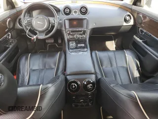 2014 Jaguar XJ with VIN SAJWA2GT0EMV61531, listed as a Copart auction lot 61071054 with 79,266 mi miles and Clean Title. Bid and sale history available at DreamBid. Image 8.