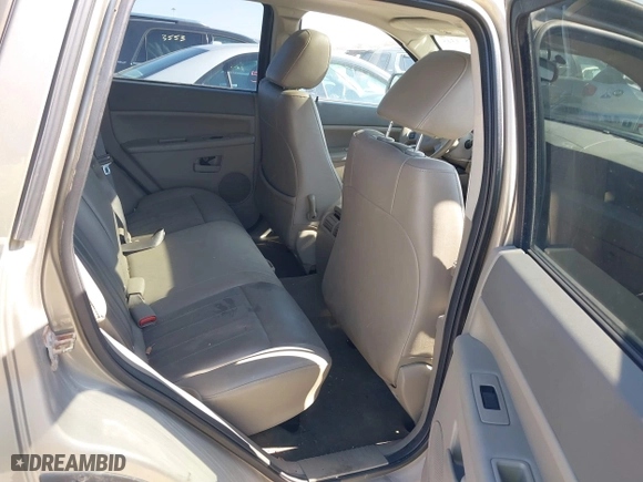 2005 Jeep Grand Cherokee Laredo with VIN 1J4HR48N35C647637, listed as a IAAI auction lot 38514345 with 167,342 mi miles. Bid and sale history available at carsss.com. Image 8.