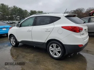 2013 Hyundai Tucson GLS with VIN KM8JU3AC0DU770079, listed as a Copart auction lot 52639835 with 212,894 mi miles and Clean Title. Bid and sale history available at carsss.com. Image 2.