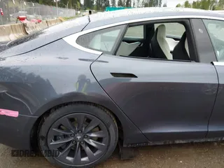 2017 Tesla Model S 100D with VIN 5YJSA1E26HF224568, listed as a IAAI auction lot 42140201 with 102,403 mi miles. Bid and sale history available at carsss.com. Image 6.