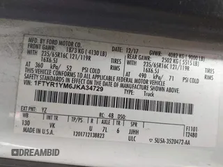 2018 Ford Transit with VIN 1FTYR1YM6JKA34729, listed as a IAAI auction lot 41931052 with 219,286 mi miles and . Bid and sale history available at DreamBid. Image 9.