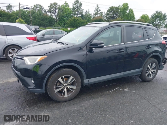 2018 Toyota RAV4 XLE with VIN 2T3WFREVXJW501296, listed as a IAAI auction lot 42358130 with 163,669 mi miles and . Bid and sale history available at DreamBid. Image 18.