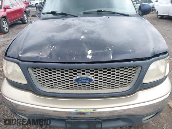 2000 Ford F-150 XL with VIN 1FTRX18L1YNA08999, listed as a IAAI auction lot 41988747 with 214,201 mi miles. Bid and sale history available at carsss.com. Image 12.