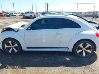 2012 Volkswagen Beetle with VIN 3VWV87AT1CM627756, listed as a IAAI auction lot 41657307 with 81,924 mi miles and . Bid and sale history available at DreamBid. Image 14.