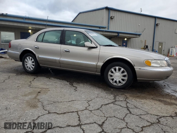 2001 Lincoln Continental z VIN 1LNHM97V41Y633841, wystawiony jako Copart lot #86695664 z przebiegiem 166 931 mil mil oraz Szkoda całkowita • Salvage title. Historia ofert i sprzedaży dostępna na DreamBid. Obrazek 4.