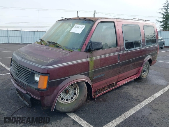1991 Chevrolet Astro Cargo z VIN 1GBDM19Z4MB136076, wystawiony jako IAAI lot #41482281 z przebiegiem 202 682 mil mil oraz . Historia ofert i sprzedaży dostępna na DreamBid. Obrazek 2.