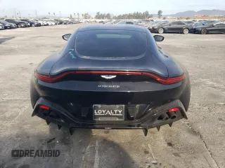 2020 Aston Martin Vantage z VIN SCFSMGAWXLGN04982, wystawiony jako Copart lot #81383264 z przebiegiem 30 891 mil mil oraz Szkody całkowita. Historia ofert i sprzedaży dostępna na DreamBid. Obrazek 6.