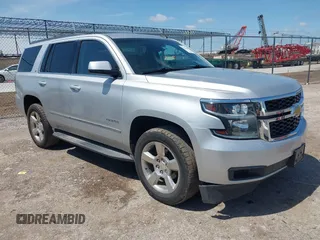 2015 Chevrolet Tahoe LT with VIN 1GNSCBKC9FR223426, listed as a IAAI auction lot 42352698 with 128,339 mi miles and . Bid and sale history available at DreamBid. Image 1.