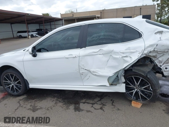 2023 Toyota Camry SE with VIN 4T1G11AK2PU822122, listed as a IAAI auction lot 41880757 with 56,106 mi miles and . Bid and sale history available at DreamBid. Image 14.