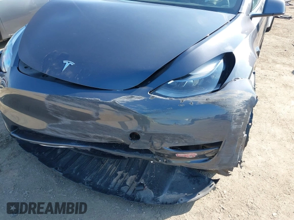 2023 Tesla Model Y Performance with VIN 7SAYGDEF5PF823122, listed as a IAAI auction lot 41546480 with 12,943 mi miles and . Bid and sale history available at DreamBid. Image 18.