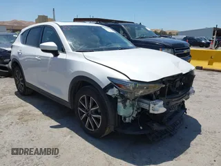 2018 Mazda CX-5 Grand Touring z VIN JM3KFBDM8J0405533, wystawiony jako IAAI lot #42395173 z przebiegiem 68 050 mil mil oraz . Historia ofert i sprzedaży dostępna na DreamBid. Obrazek 1.