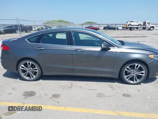 2020 Ford Fusion Titanium with VIN 3FA6P0D9XLR131042, listed as a IAAI auction lot 42560444 with 95,351 mi miles and . Bid and sale history available at DreamBid. Image 13.