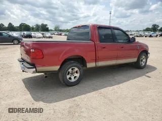 2001 Ford F-150 XLT with VIN 1FTRW076X1KC42302, listed as a Copart auction lot 59868295 with 234,772 mi miles and Salvage title. Bid and sale history available at DreamBid. Image 3.