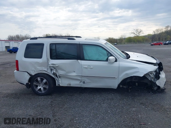 2014 Honda Pilot Touring with VIN 5FNYF4H97EB046879, listed as a IAAI auction lot 42017280 with 167,564 mi miles and . Bid and sale history available at carsss.com. Image 14.