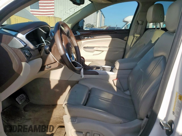 2016 Cadillac SRX Performance Collection with VIN 3GYFNCE37GS573748, listed as a Copart auction lot 66300135 with 136,619 mi miles and Salvage title. Bid and sale history available at DreamBid. Image 7.