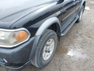 2000 Mitsubishi Montero Sport LS with VIN JA4LS31HXYP037471, listed as a IAAI auction lot 41820992 with 141,567 mi miles. Bid and sale history available at carsss.com. Image 14.