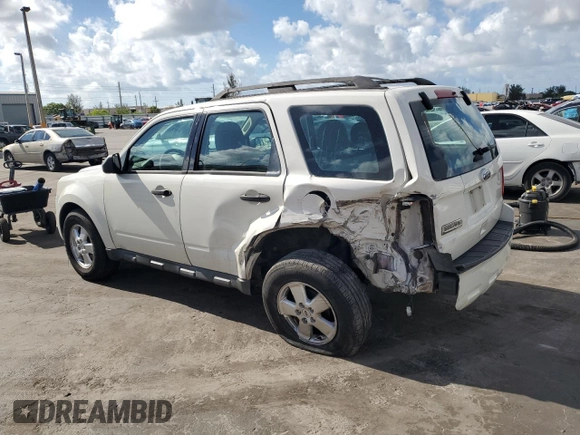 2011 Ford Escape XLS with VIN 1FMCU9C71BKC08406, listed as a Copart auction lot 61359975 with 182,954 mi miles and Salvage title. Bid and sale history available at DreamBid. Image 2.