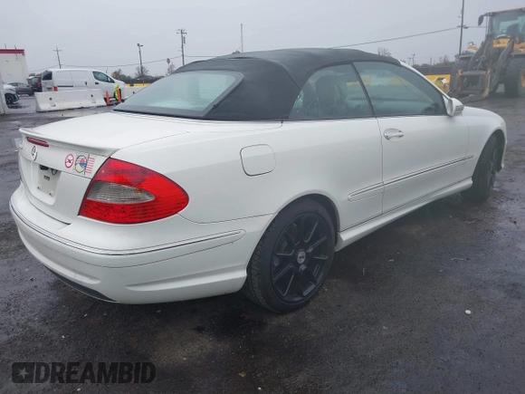 2006 Mercedes-Benz CLK-Class 5.0L with VIN WDBTK75G36T066621, listed as a IAAI auction lot 41009612 with 135,931 mi miles. Bid and sale history available at carsss.com. Image 4.