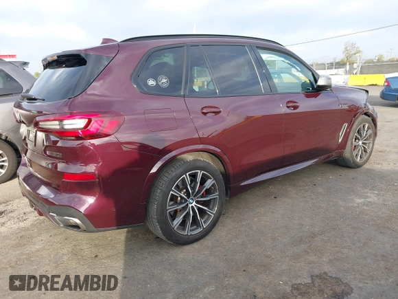 2021 BMW X5 M50i with VIN 5UXJU4C04M9G03418, listed as a IAAI auction lot 40705167 with 24,073 mi miles and . Bid and sale history available at DreamBid. Image 4.