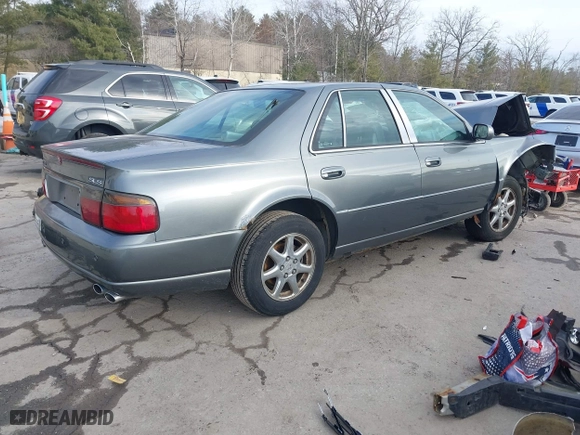 2003 Cadillac Seville Luxury SLS with VIN 1G6KS54Y63U167768, listed as a IAAI auction lot 41699674 with 112,755 mi miles. Bid and sale history available at carsss.com. Image 4.