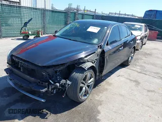 2015 Infiniti Q50 Premium z VIN JN1BV7AR2FM416586, wystawiony jako IAAI lot #41728760 z przebiegiem 138 446 mil mil oraz . Historia ofert i sprzedaży dostępna na DreamBid. Obrazek 18.