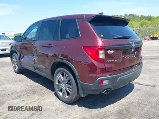 2019 Honda Passport EX-L with VIN 5FNYF7H59KB009956, listed as a IAAI auction lot 42021317 with 58,121 mi miles and . Bid and sale history available at DreamBid. Image 3.