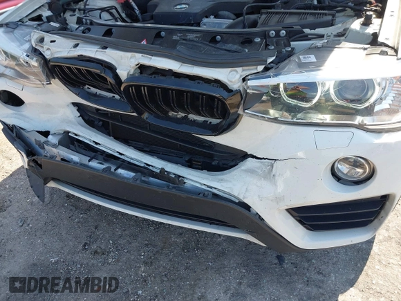 2015 BMW X4 xDrive28i with VIN 5UXXW3C59F0M88331, listed as a IAAI auction lot 42093953 with 138,205 mi miles and . Bid and sale history available at DreamBid. Image 6.