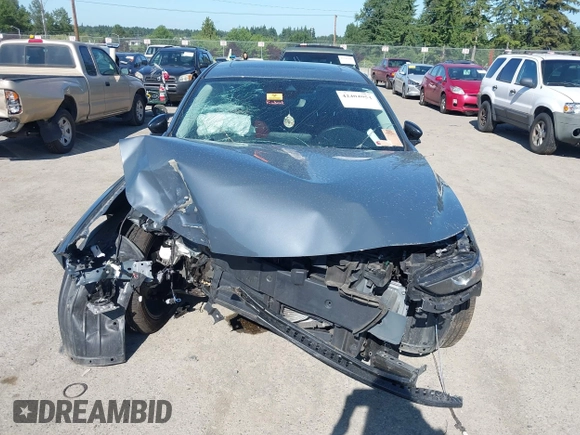 2023 Mazda 3 S Carbon Edition with VIN 3MZBPACM5PM376545, listed as a IAAI auction lot 42404054 with Not provided miles and . Bid and sale history available at DreamBid. Image 12.
