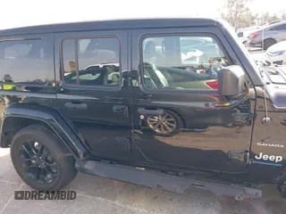 2023 Jeep Wrangler Sahara with VIN 1C4JJXP67PW556933, listed as a IAAI auction lot 41587035 with 20,463 mi miles and . Bid and sale history available at DreamBid. Image 13.
